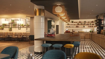 zentraler Küchentisch im Essbereich des Bassena Hotels