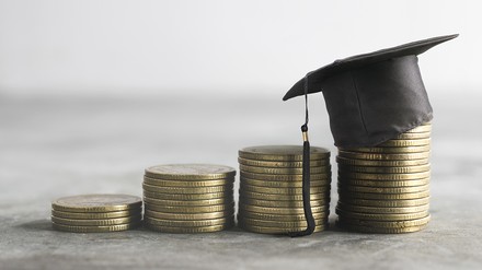 Geldmünzen mit Doktorhut