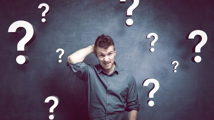 Mann mit Fragezeichen