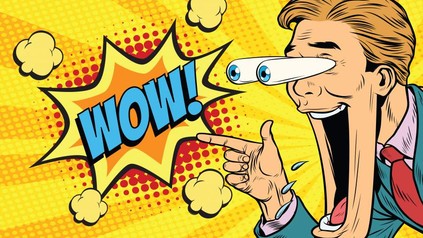 Eine Cartoonfigur mit offenem Mund und hervorquellenden Augen zeigt auf das Wort WOW