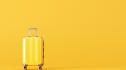 Gelber Rollkoffer
