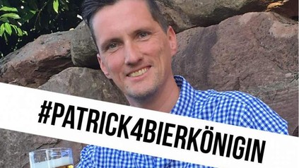 Patrick Karch und ein Schriftzug auf dem steht #Patrick4Bierkönigin