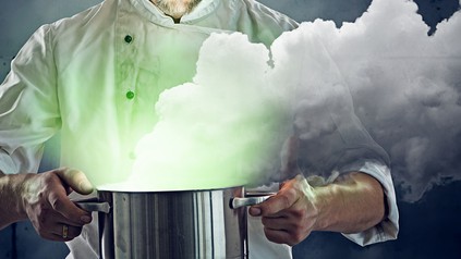 Ein Topf, aus dem grüner Rauch austritt