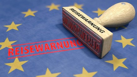 Reisewarnung und Europaflagge