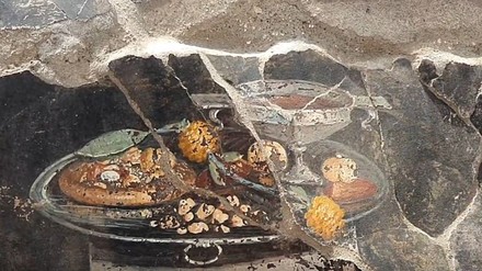 Zeigt dieses 2.000 Jahre alte Wandgemälde den Vorgänger der 1889 erfundenen Pizza?