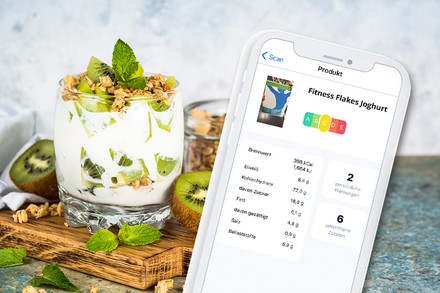 Ein Handy vor einer Schüssel Joghurt