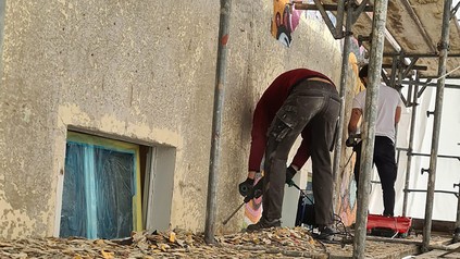 Bauarbeiten an der Fassade des "Happy Go Lucky" Hostels