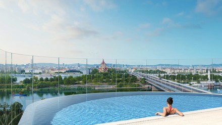 Blick auf die Stadt mit einem Infinity-Pool im Vordergrund