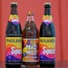 Zwei Spezi-Flaschen des Herstellers Paulaner stehen neben einer Flasche Mio-Mio-Cola-Orange-Mische