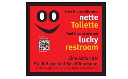 Ein Aufkleber auf dem Hier finden Sie eine nette Toilette eine Aktion der Stadt Basel und Basel Tourismus steht