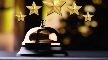 Hotelsterne über einer Klingel