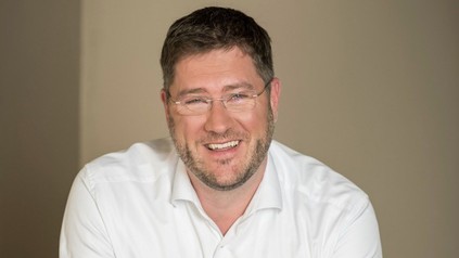 Max C. Luscher, Geschäftsführer