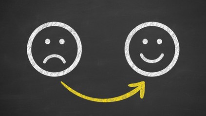 Trauriges Smiley und fröhliches Smiley