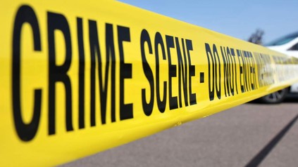 Absperrband mit Aufschrift: "crime scene - do not enter"