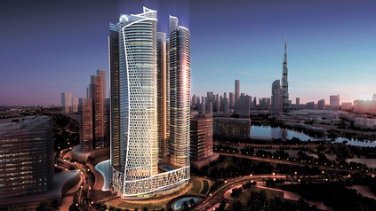 Blick auf ein modernes Hotelgebäude bei Dämmerung in Dubai, Paramount Hotel Dubai