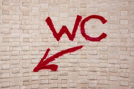 WC Graffiti auf Wand