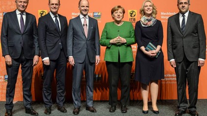 Angela Merkel mit einigen Würdenträgern bei der Eröffnung der Reisemesse ITB in Berlin