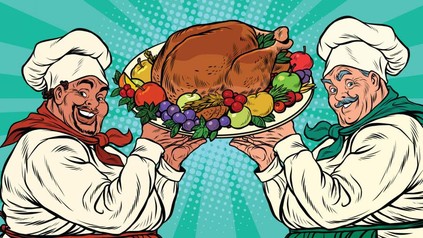 Zwei Köche halten ein Gericht in den Händen