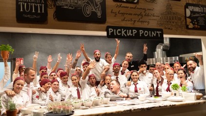 Vapianomitarbeiter freuen sich