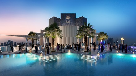 Der Pool des SLS Dubai bei Sonnenuntergang