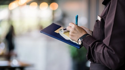 Eine Gästeliste im Restaurant