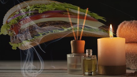 Eine Duftkerze mit Burger-Geruch