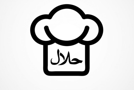 Kochmütze mit arabischer Schrift