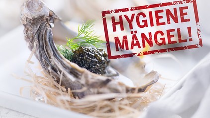 Eine Auster mit einem Stempel "Hygienemängel"